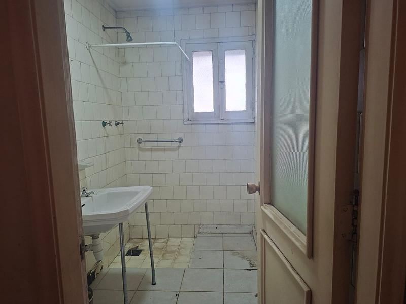 Gran Terreno de 611 m² en Barrio Simón Bolívar, Ñuñoa | Sólida Casa Familiar con Enorme Potencial